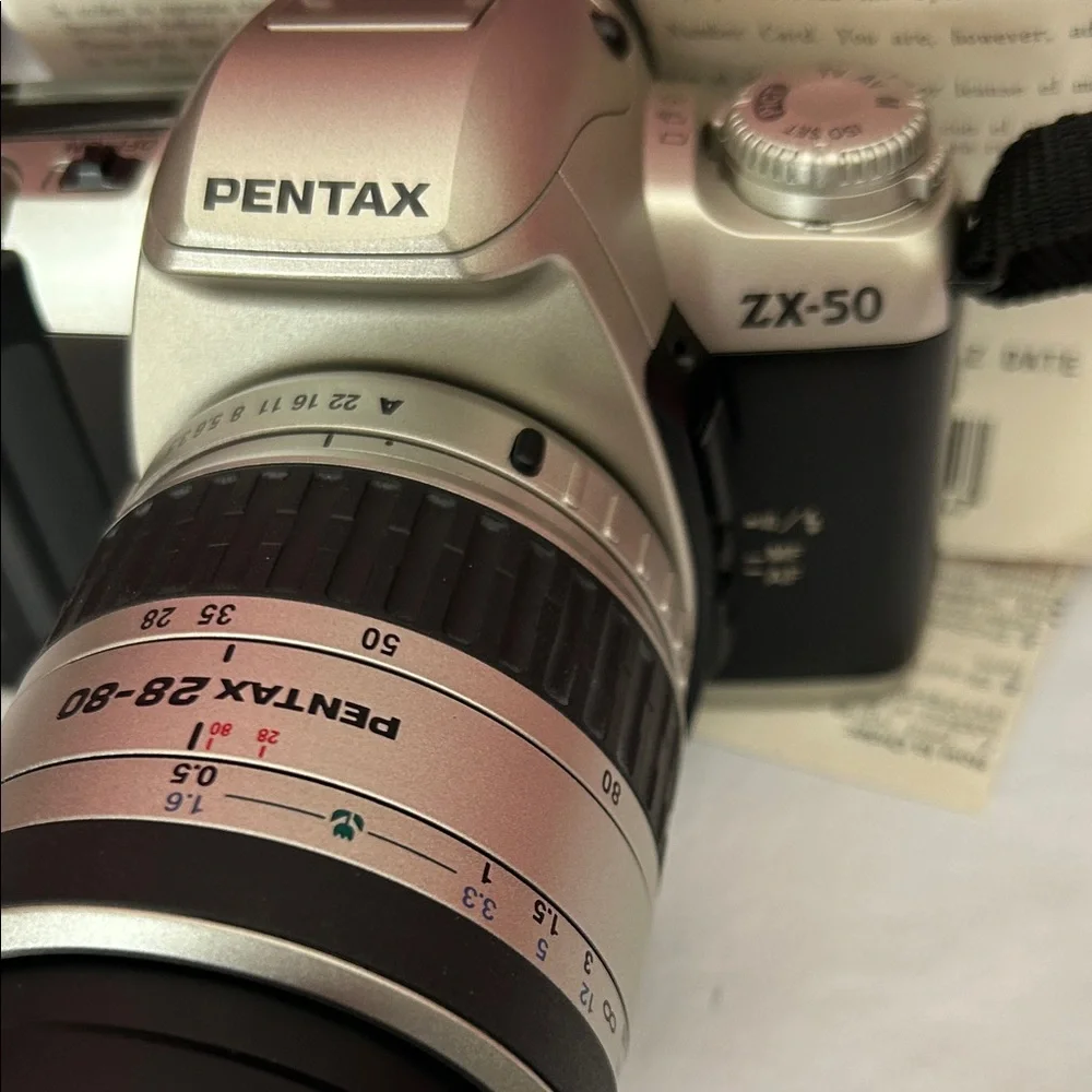 Pentax ZX-50 Black and Silver Digital Camera with Strap